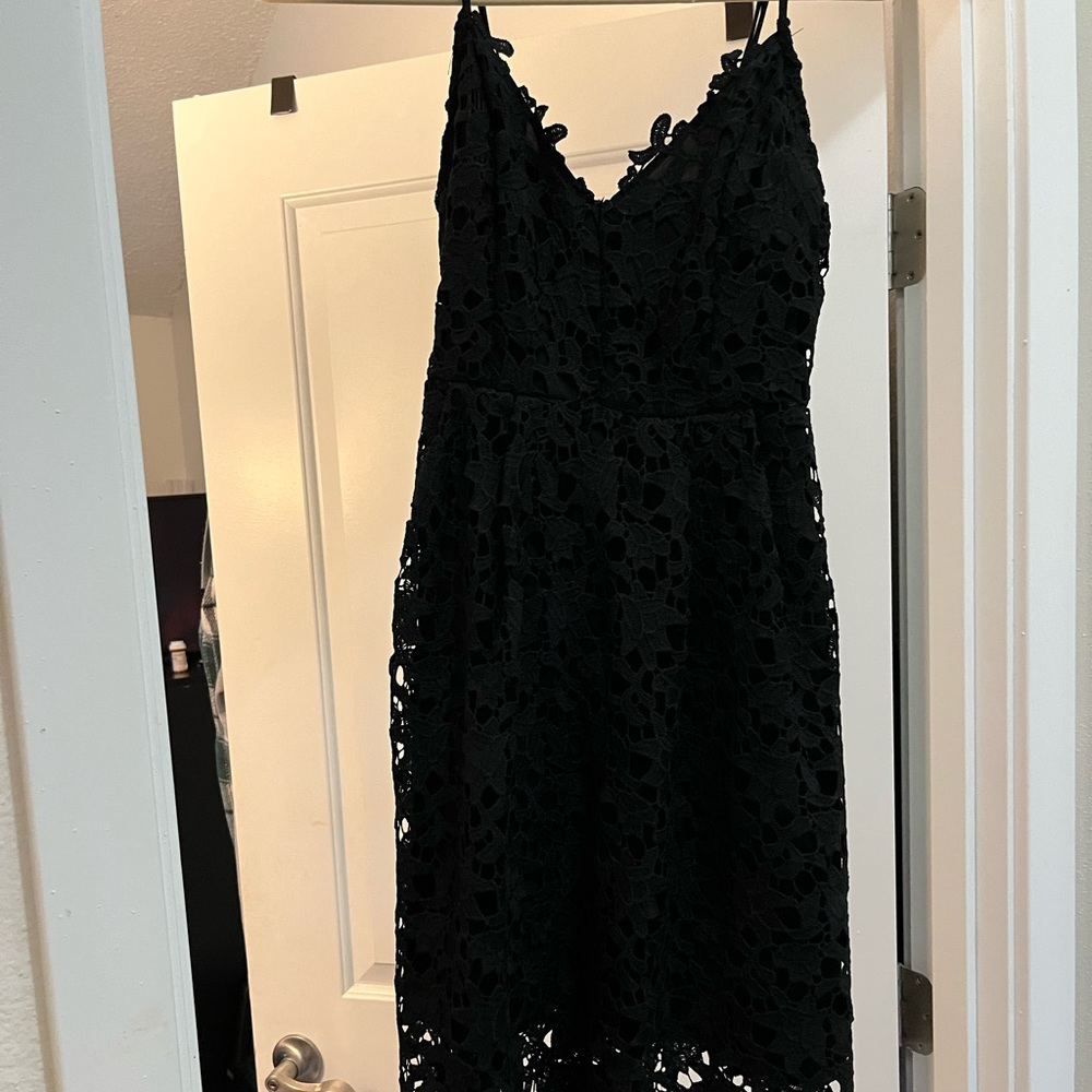 Black lace like dress. Spaghetti strap.